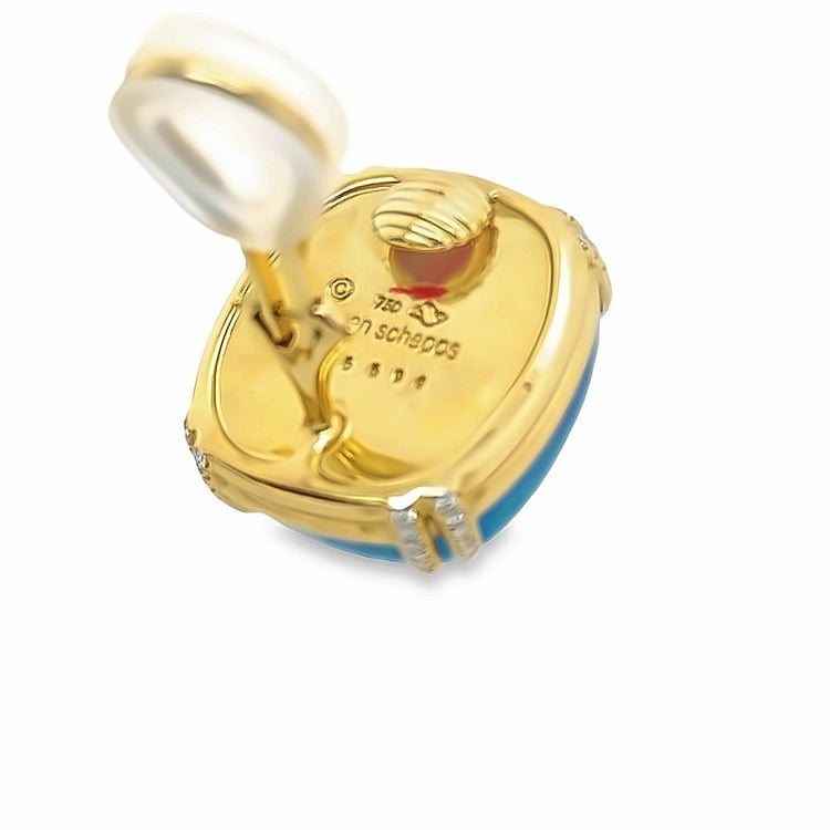 View of the back of the blue topaz studs. Inscription is shown in the image.
