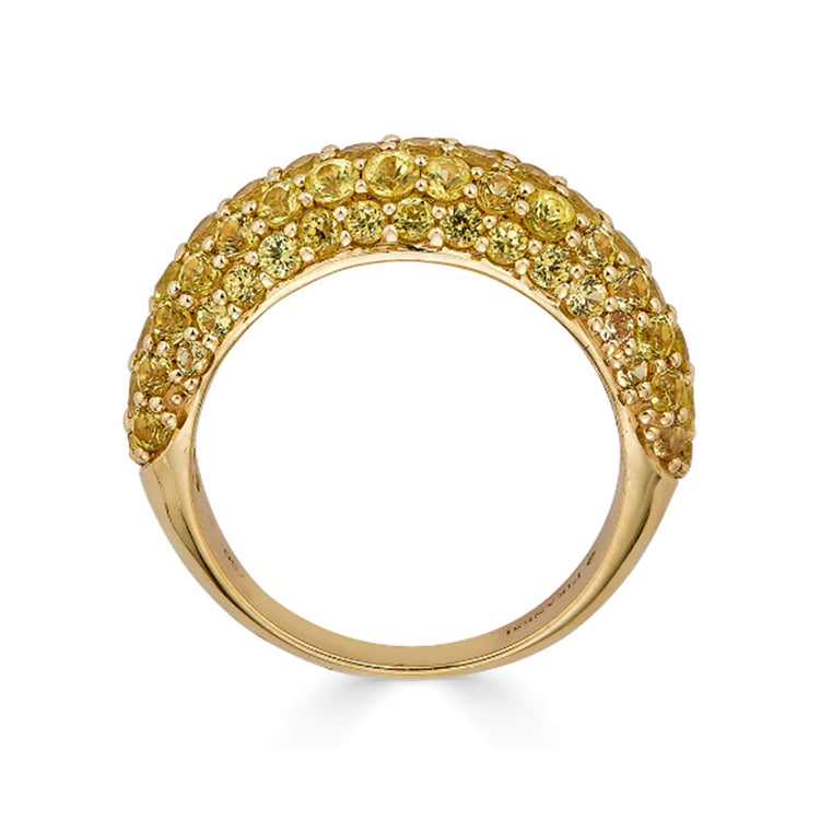 Round-cut yellow sapphires on an 18K yellow gold dome-shaped ring