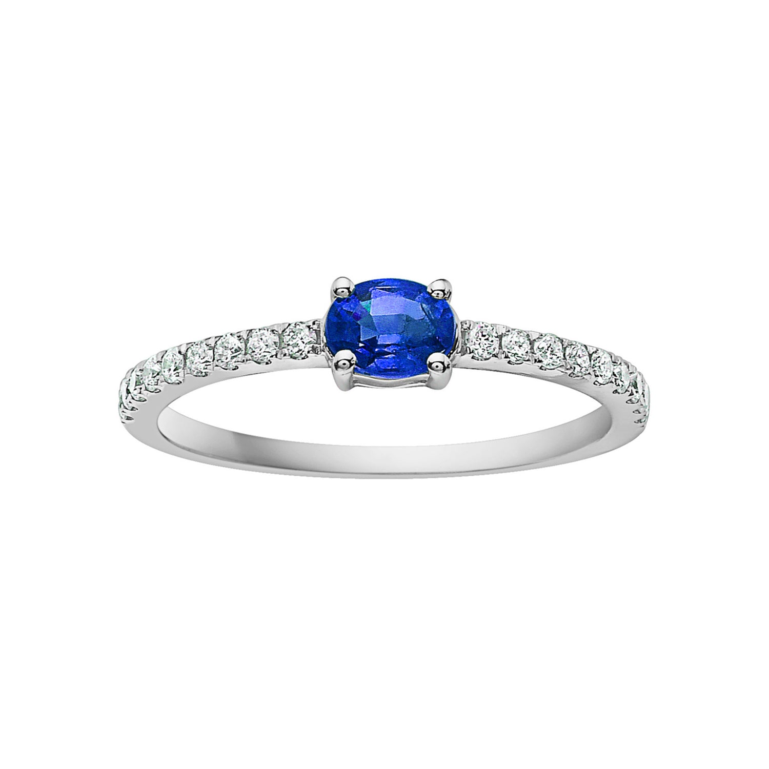 Close up of the 14k White Gold Sapphire and Diamond Ring. Featuring one 0.52CT blue sapphire. The band has 18 round diamonds (0.16CT).