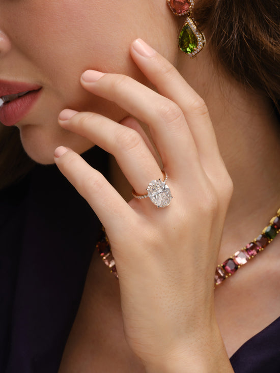 Oval Cut Diamond Solitaire Ring with Pavé Band