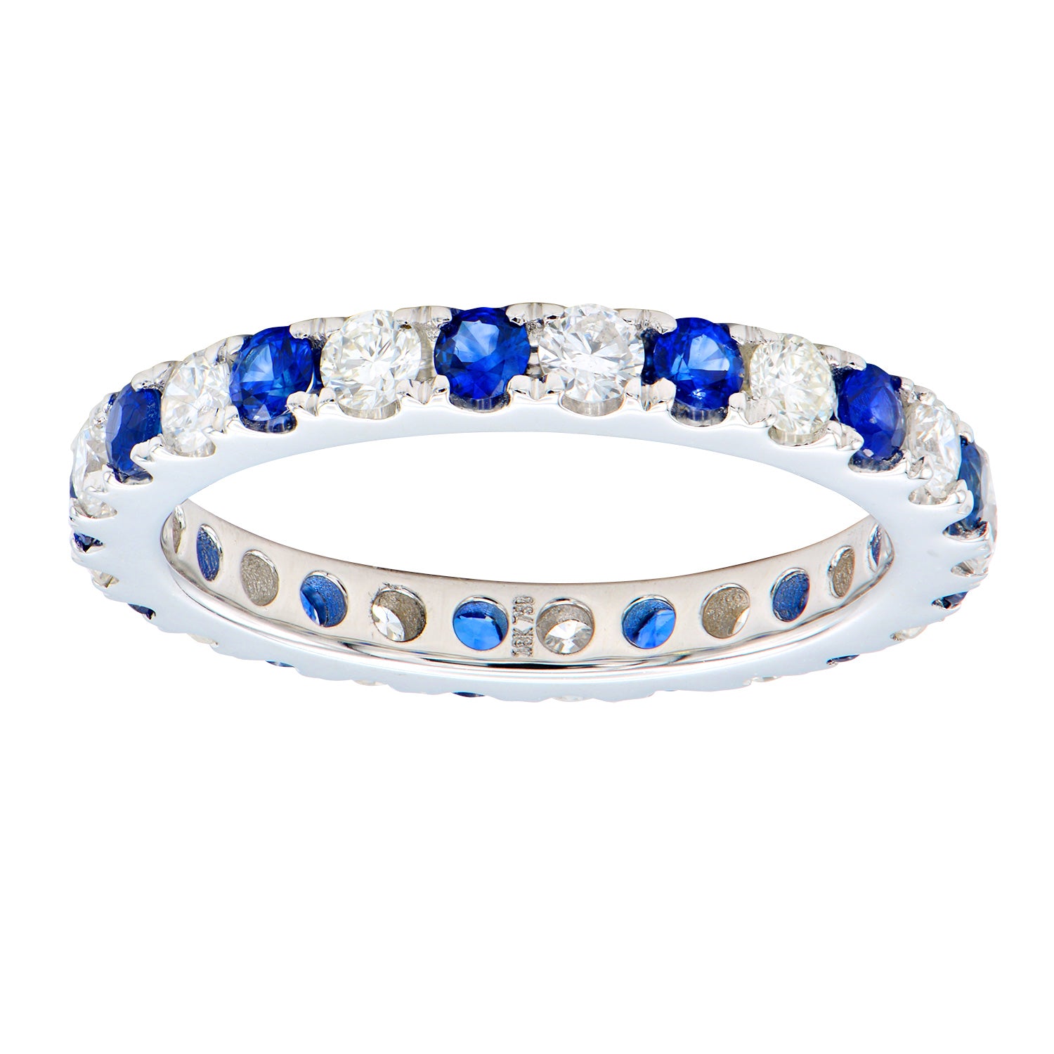Close up of our gorgeous Sapphire and Diamond Eternity Band featuring alternating blue sapphire gemstones and round white diamonds.