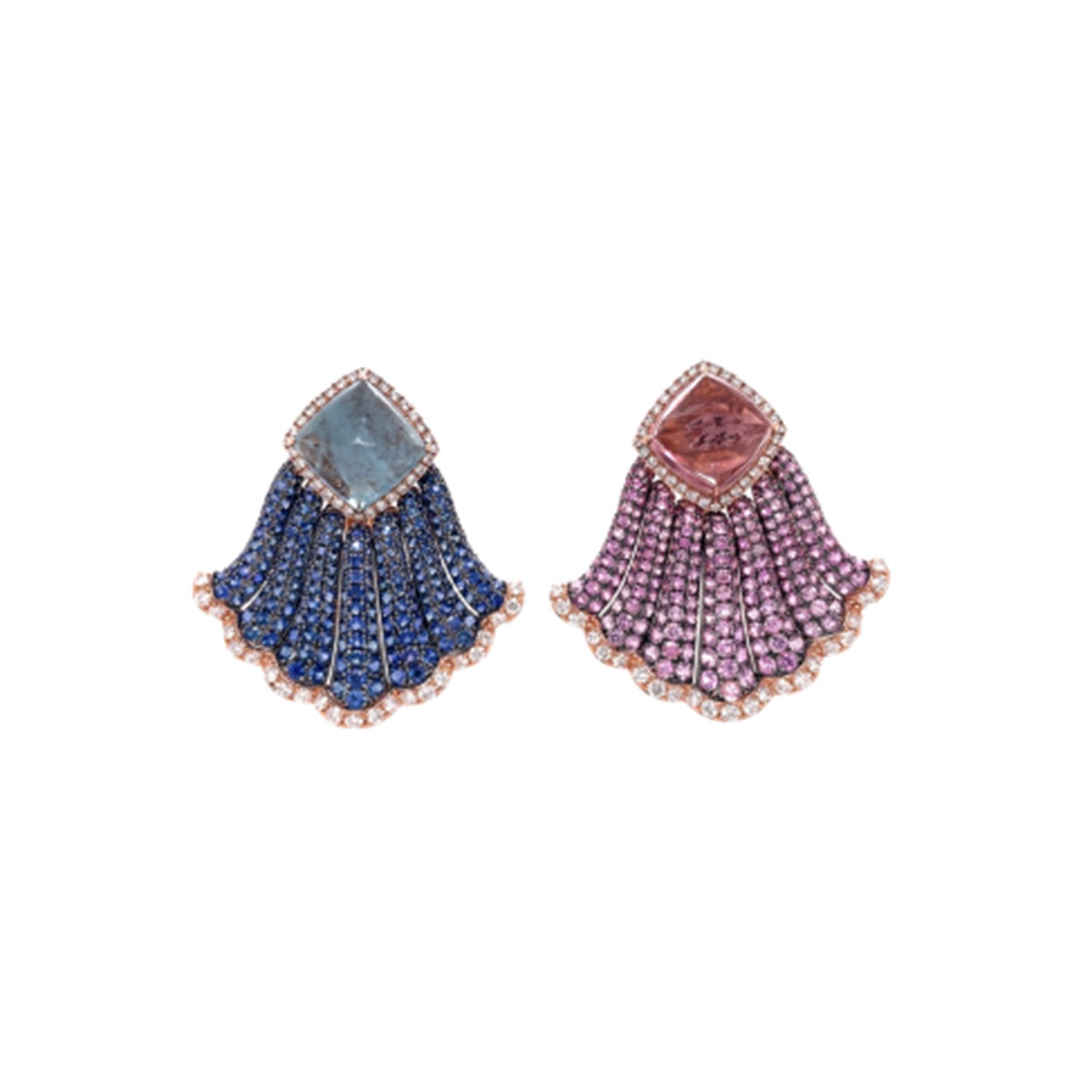 Close up view of the aquamarine and pink tourmaline earrings. Featuring one 8.39CT Aquamarine, one 9.15CT Pink Tourmaline, 12.03CTs of Blue and Pink Sapphires, and 2.05cts of Diamonds Set in 18K Pink and Black Gold.