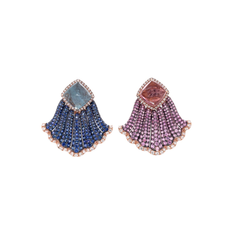 Close up view of the aquamarine and pink tourmaline earrings. Featuring one 8.39CT Aquamarine, one 9.15CT Pink Tourmaline, 12.03CTs of Blue and Pink Sapphires, and 2.05cts of Diamonds Set in 18K Pink and Black Gold.