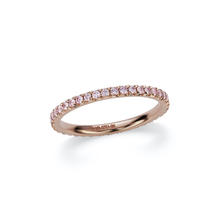 Close up of the Pink Diamond French Pave Eternity Ring. Featuring certified argyle pink diamonds set in 18k rose gold.