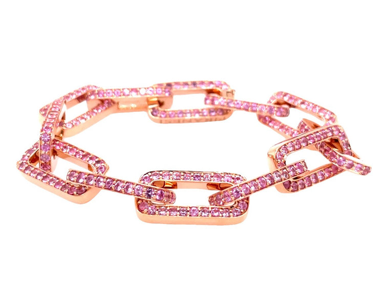 18K rose gold twelve link bracelet, each adorned with round-cut pink sapphires