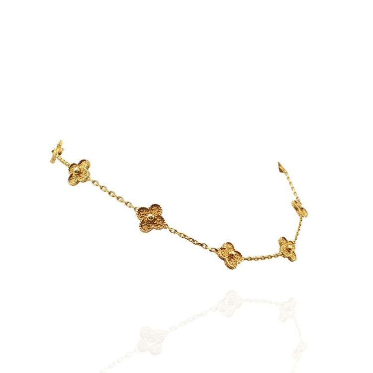 Side view of the VCA Alhambra Necklace.
