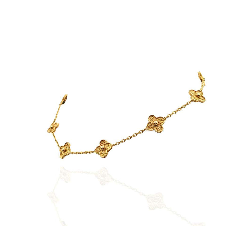 Side view of the VCA Alhambra Necklace.