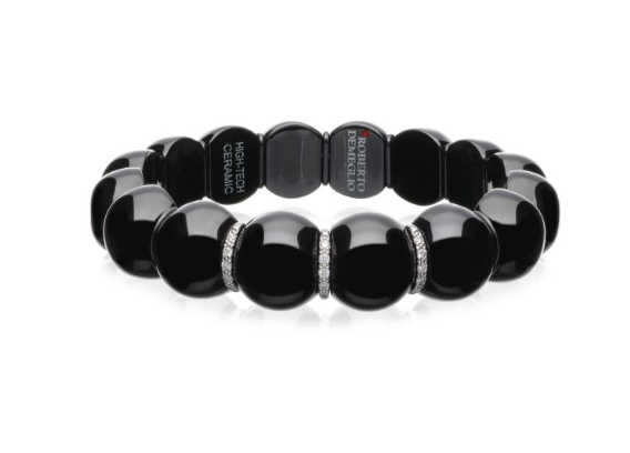 Black ceramic domed links on a stretch bracelet with alternating 18K white gold rondelles embellished with diamonds