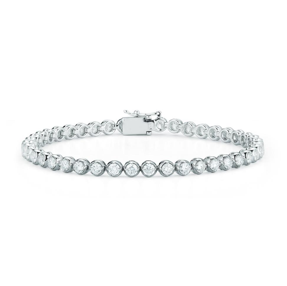 Close up view of the bezel set diamond tennis bracelet with 8.25cts of round diamonds set in 14k white gold.