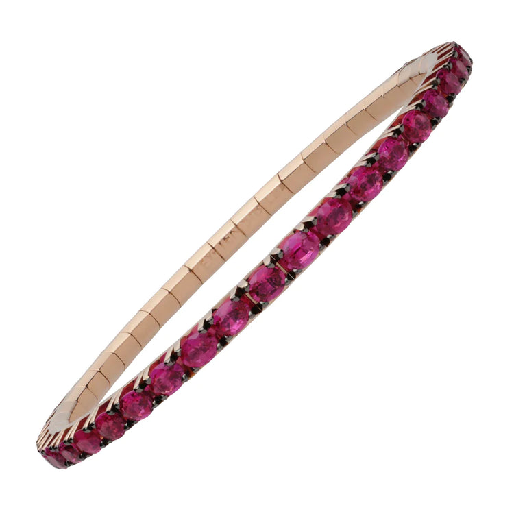 Stretch tennis bracelet with 10.20 ct oval-cut red rubies on 18K yellow, white, rose gold