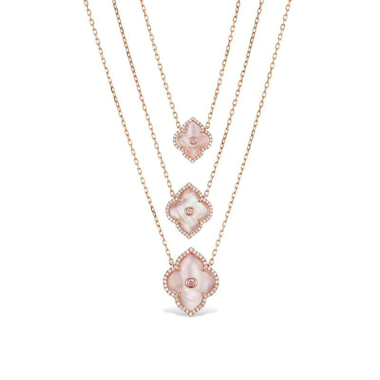 Large Krypel Les Fleurs Design necklace with a pink argyle diamond and white diamond embellishments on pink mother of pearl