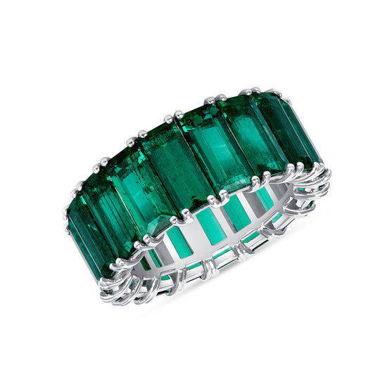 Classic eternity band featuring 18 baguette-cut emeralds on a shared prong setting