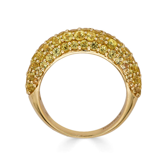 Round-cut yellow sapphires on an 18K yellow gold dome-shaped ring