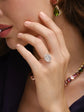 Oval Cut Diamond Solitaire Ring with Pavé Band