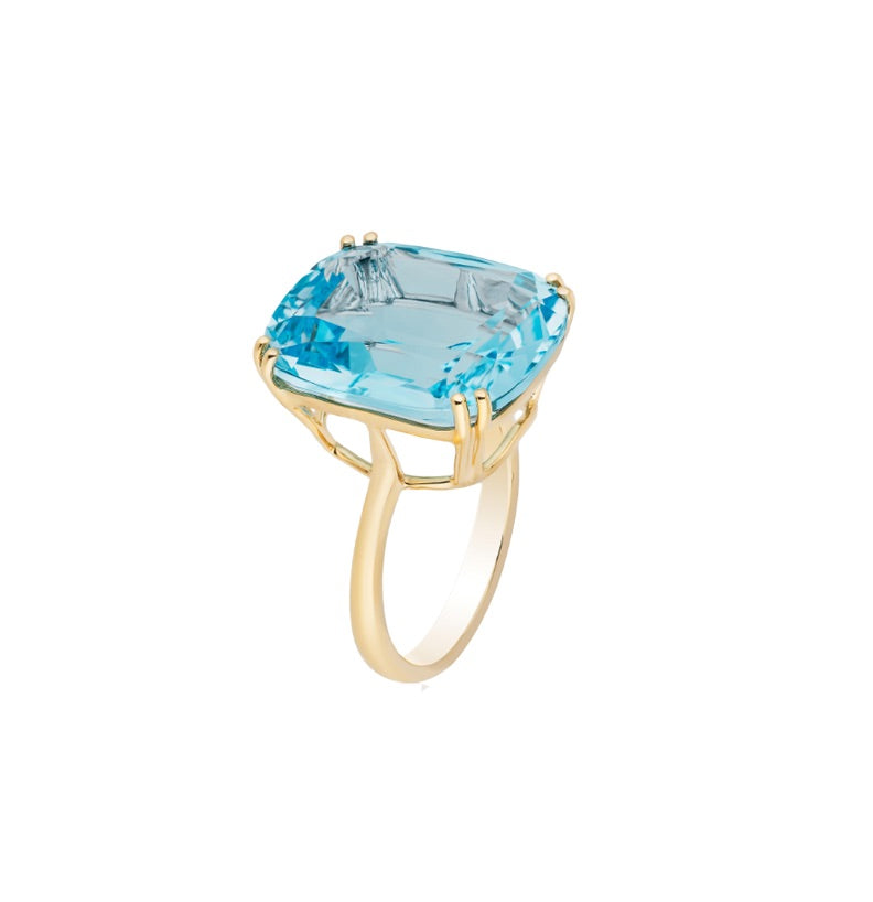 Cushion-cut blue topaz ring set on 18K yellow gold
