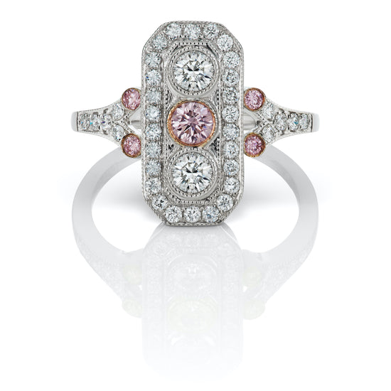 Close up view of the Rectangular Art Deco Diamond Ring in 18k White Gold. The center stone is a round fancy argyle pink diamond. 