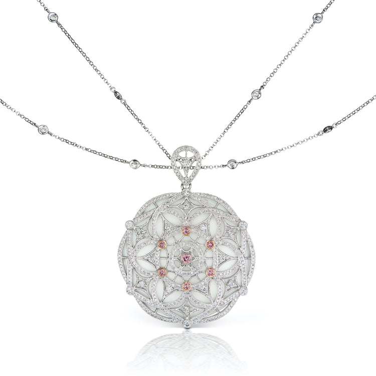Close up view of the argyle pink diamond medallion necklace.