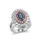 Close-up view of the Diamond Dome Ring.  Center stone is a Marquise Fancy Blue Diamond. Center stone is surrounded by 0.53CTs of Pear Shape Fancy Purplish Pink Diamonds, 0.23CTs of Round Argyle Blue Diamonds , and 3.52CTs of White Diamonds. Set in 18K Pink and White Gold.