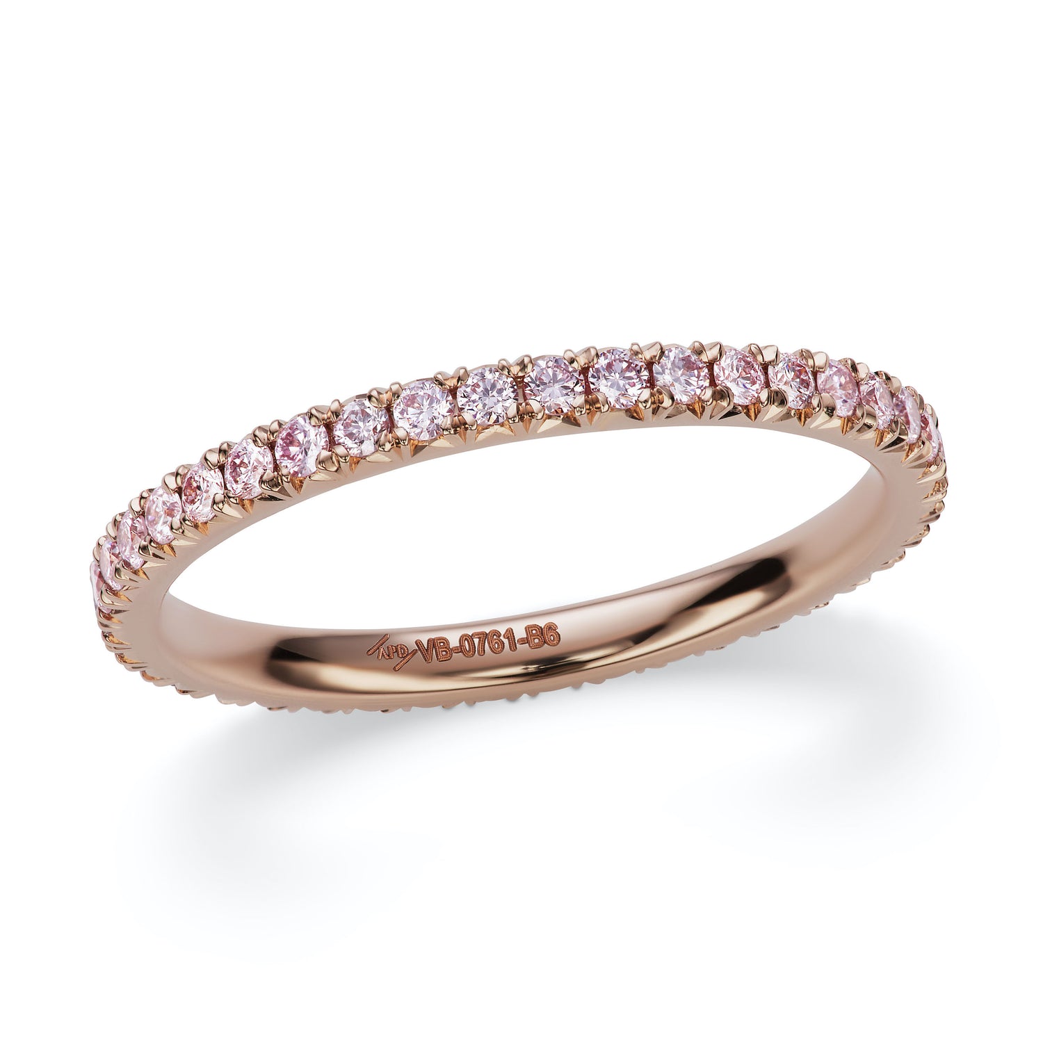 Close up of the Pink Diamond French Pave Eternity Ring. Featuring certified argyle pink diamonds set in 18k rose gold. 