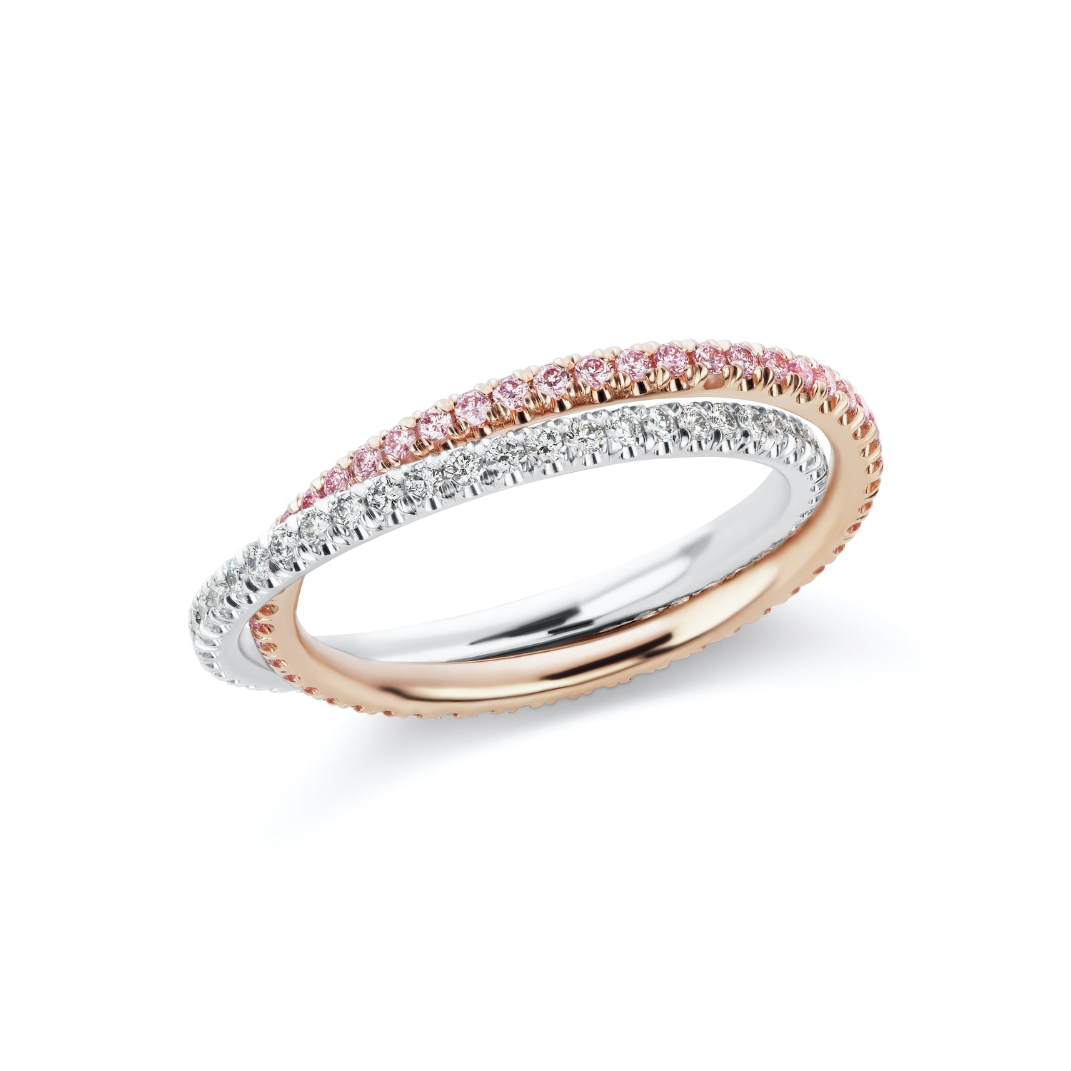 Close up view of the Double Diamond Band, with interlocking eternity bands. One band has white diamonds set in platinum and the other has argyle pink diamonds set in 18k rose gold.