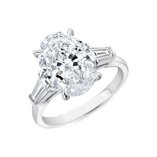 Oval Cut Diamond and Baguette Diamond Side Stone Ring