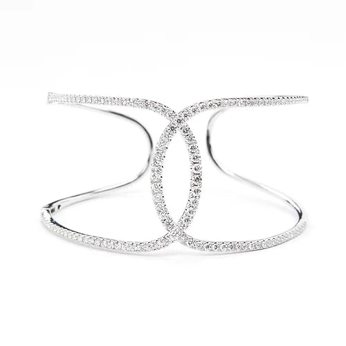 Elegant 18K white gold infinity bangle adorned with 112 round-cut diamonds