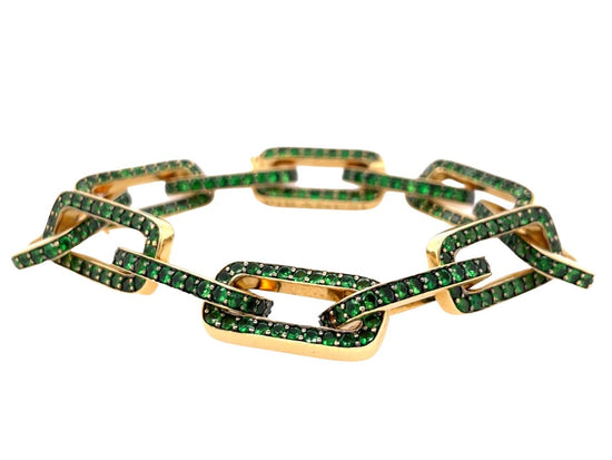 18K yellow gold twelve link bracelet, each adorned with round-cut green tsavorite