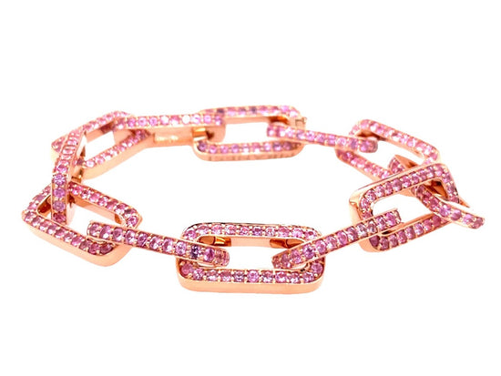 18K rose gold twelve link bracelet, each adorned with round-cut pink sapphires 