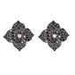 Large flower stud earrings with round-cut black and white diamonds embellishments