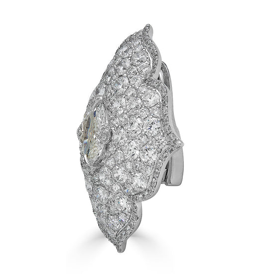 Close up side view of the Diamond Flower Earring, featuring oval and round white diamonds set in 18k white gold.