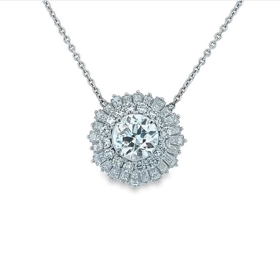 Platinum halo necklace featuring a 3 ct round-cut diamond in the center with a hidden halo detail of baguette-cut diamonds
