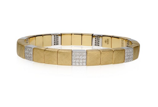 18K matte yellow gold beaded stretch bracelet featuring seven beads adorned with diamonds in a pavé setting