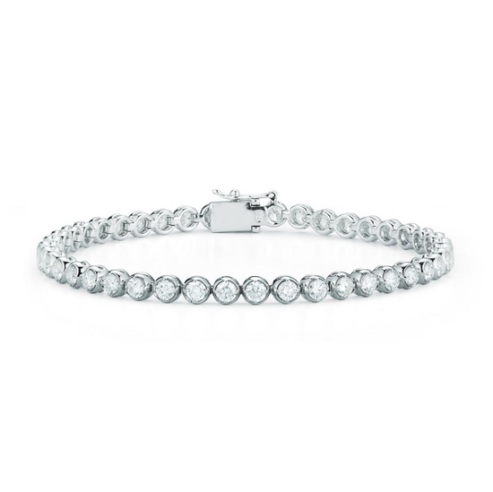 Close up view of the bezel set diamond tennis bracelet with 8.25cts of round diamonds set in 14k white gold. 