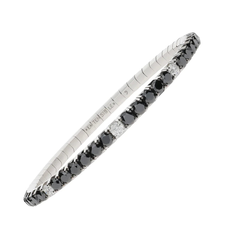 8.65 ct black and white diamond stretch tennis bracelet adorned with 53 round-cut diamonds
