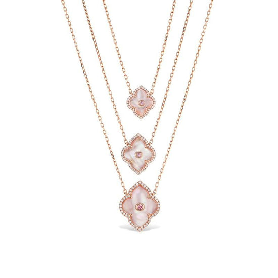 Large Krypel Les Fleurs Design necklace with a pink argyle diamond and white diamond embellishments on pink mother of pearl 