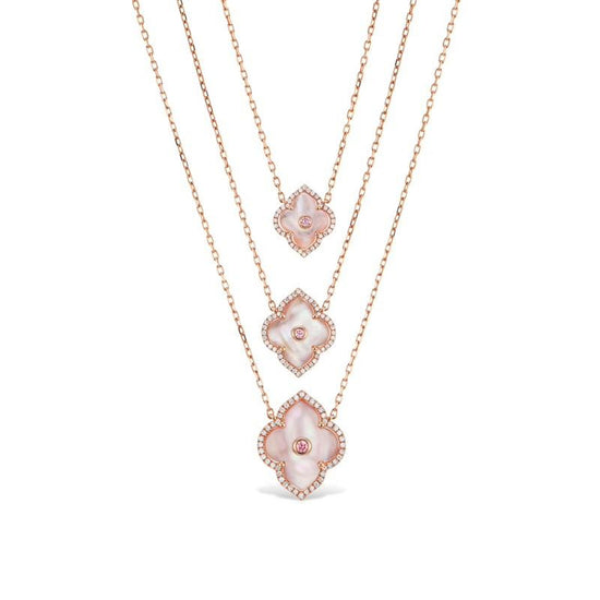 Large Krypel Les Fleurs Design necklace with a pink argyle diamond and white diamond embellishments on pink mother of pearl
